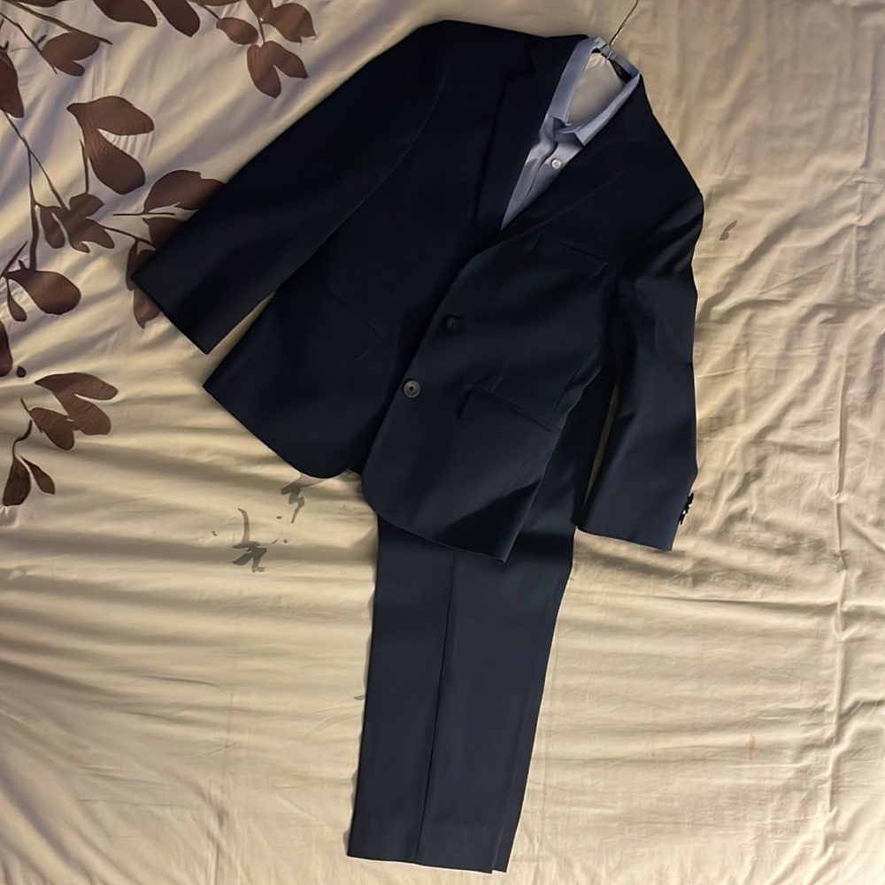 Boys suit jacket, matching pants, and dress shirt.